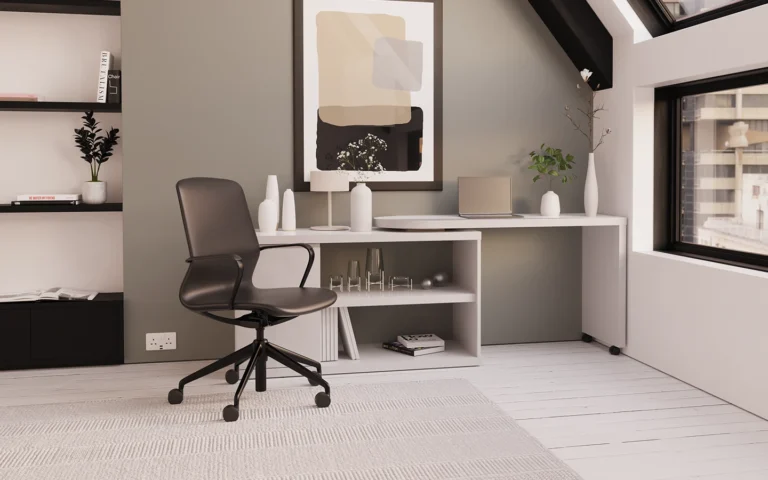 Office chair positioned in front of a sleek white desk in a modern, minimalistic room.